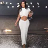 Kim Kardashians schiere weiße Strick zweiteilige Kleid elegante durchsichtige Pullover Crop Top und