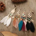 Boucles d'oreilles goutte d'eau à franges bohèmes vintage plume colorée tempérament sauvage