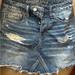 American Eagle Outfitters Skirts | Ae Sexy Distressed Button Fly Denim Mini Skirt (100% Cotton) Sz 0 - Great Cond | Color: Blue | Size: 0