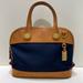 Dooney & Bourke Bags | Dooney & Bourke “Cabriolet” Navy Canvas/ Tan Leather Domed Satchel | Color: Blue/Tan | Size: 11.5” W X 9.25” H X 5” Base/ 5” Handle Drop