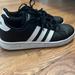 Adidas Shoes | Boys Size 4. Black And White Adidas Sneaker | Color: Black/White | Size: 4bb