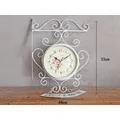 Horloge murale de style européen en fer blanc