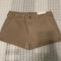 American Eagle Outfitters Shorts | American Eagle Outfitters Super Stretch Shortie Size 8 Khaki Cargo Shorts | Color: Tan | Size: 8