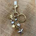 Coach Accessories | Coach Silver And Gold Stars Dangle Keychain / Bag Charm New | Color: Gold/Silver | Size: Os