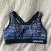 Nike Intimates & Sleepwear | Nike Pro Racerback Sports Bra | Color: Black/Purple | Size: Xs