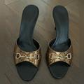 Gucci Shoes | Gucci Guccissima Gold Star Horsebit Metallic Leather Slides Heels Eur 39.5 | Color: Black/Gold | Size: Eur 39.5