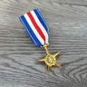 Ausländische Merchandise-Medaille und militärische Belobigung