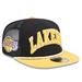 Men s New Era Black/Gold Los Angeles Lakers Throwback Team Arch Golfer Snapback Hat - OSFA