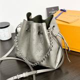 Louis Vuitton Bags | Louis Vuitton 2023 Bella Mahina Leather Bucket Bag In Gray Metallic | Color: Gray/Silver | Size: 7.5”/5.5”/8.7”
