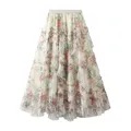 Acquista la gonna a rete floreale colorata patchwork irregolare per la gonna a trapezio da donna con temperamento in stile corte francese primaverile 2025