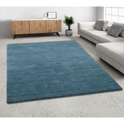 Wollteppich THEKO "Gabbeh Uni, Handweb Teppich, meliert, reine Wolle, handgewebt" Gr. 5, grau (grau, blau), B:200cm H:14mm L:200cm, Wolle, Teppiche, Schlafzimmer, Wohnzimmer, Esszimmer, auch als Läufer oder rund Image