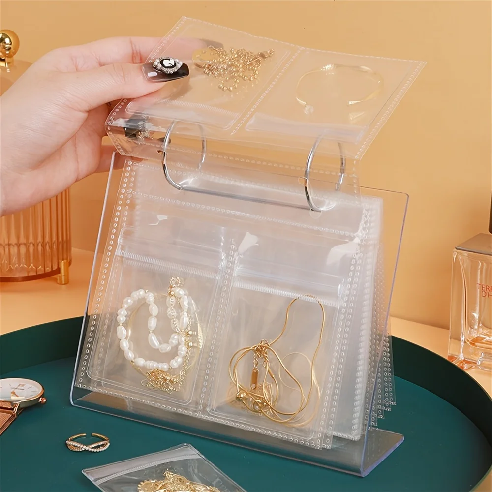 1pc durchsichtiges Plastikschmuck-Aufbewahrung sbuch mit 30 Taschen, tragbare staub dichte Aufbewahrung tasche für Ohrringe, Aufbewahrung im Haushalt
