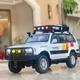 1:24 pressofuso in lega Land Cruiser LC80 modello di auto giocattolo con musica leggera fuoristrada ruota tirare indietro veicolo per bambini regalo per bambini
