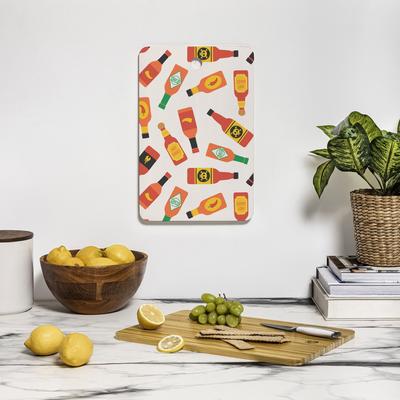 Little Arrow Design Co hot sauce bottles on cream Cutting Board