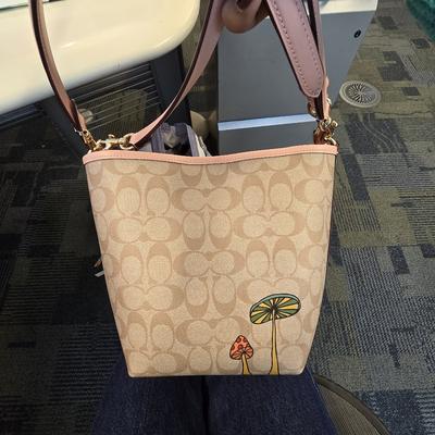 Coach Bags | Coach X Observed By Us City Bucket Bag In Signature Canvas | Color: Tan | Size: Os