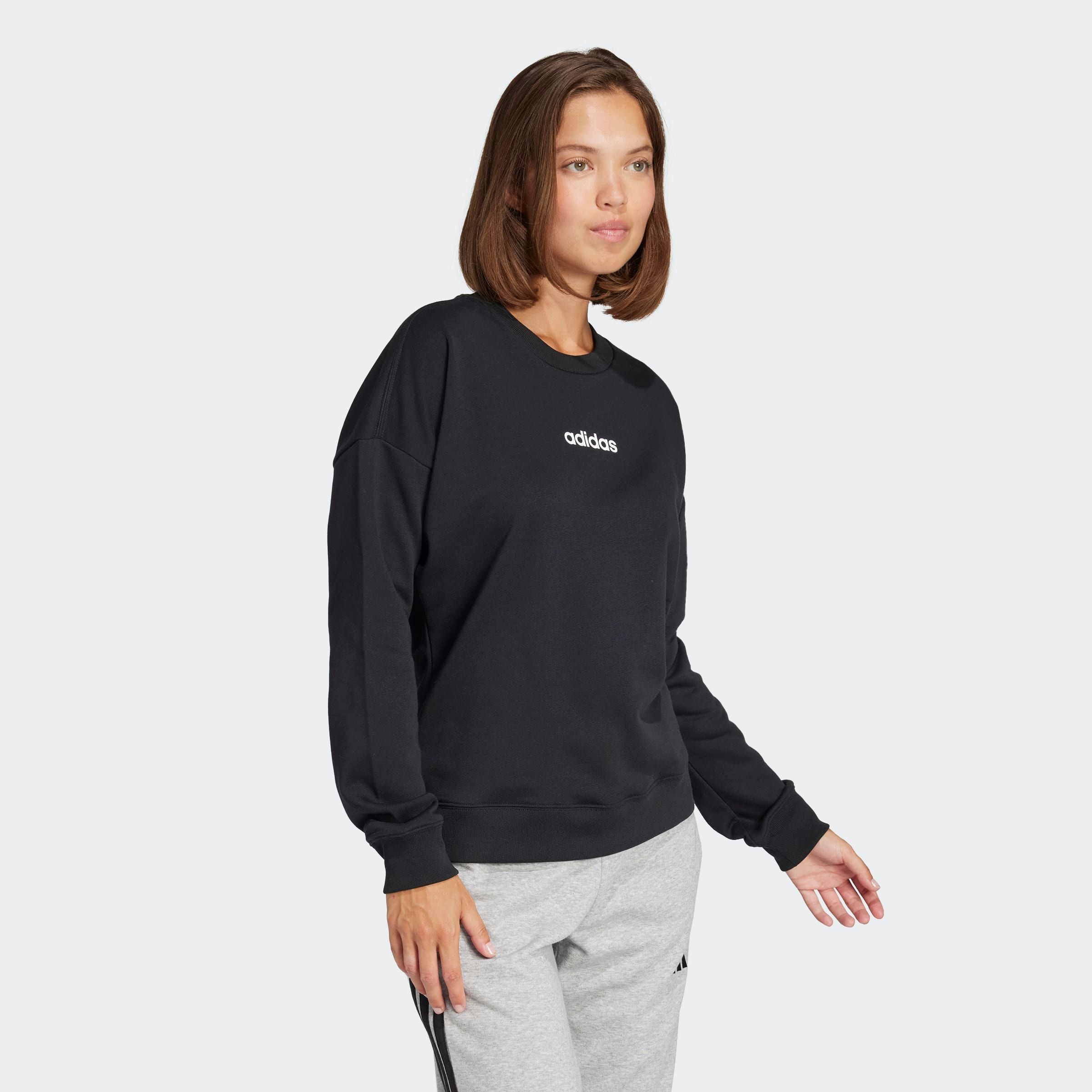 Sweatshirt ADIDAS SPORTSWEAR "W LIN FT SWT", Damen, Gr. M, schwarz-weiß (schwarz, weiß), Obermaterial: 55% Baumwolle, 36% Polyester, 9% Viskose, Rundhals, angesetztes Bündchen, Sweatshirts Sweatshirt