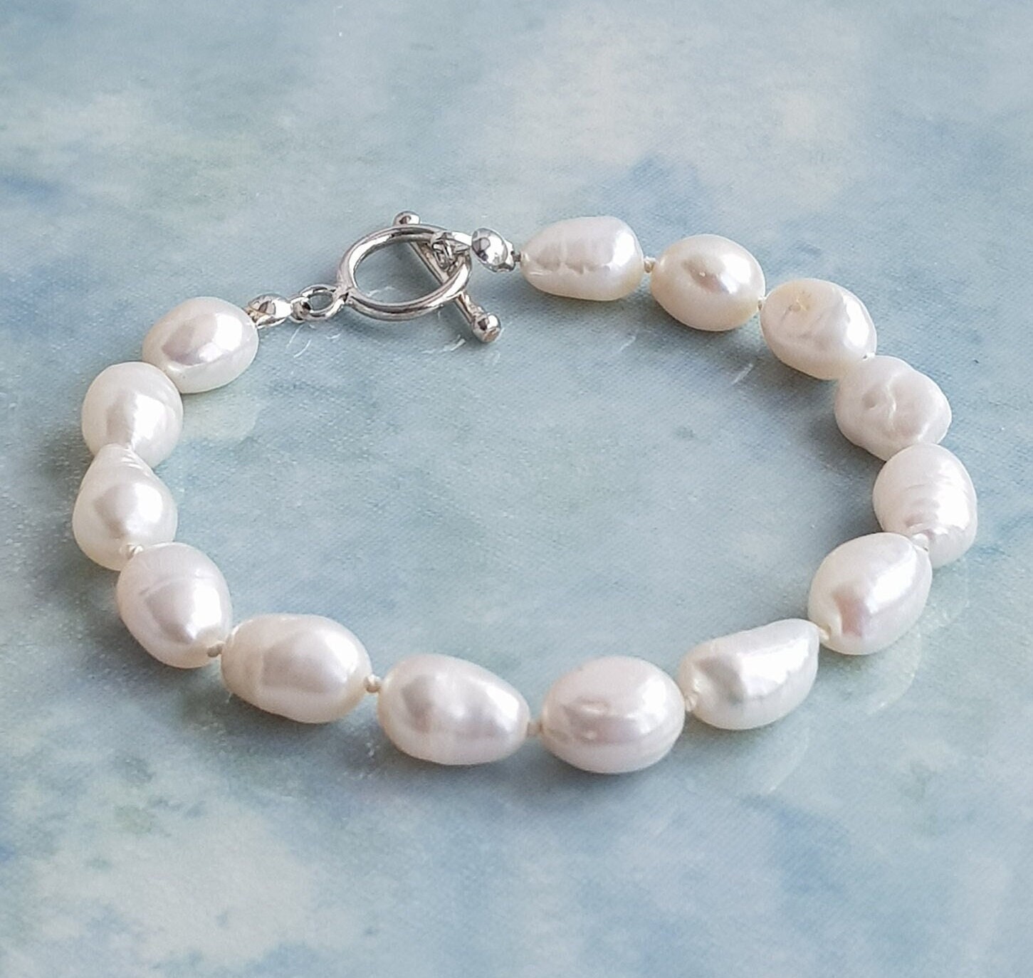 Bracciale in argento sterling 925 con perle d'acqua dolce bianche. Bracciale con perle d'acqua dolce. Bracciale con perle d'acqua dolce barocche. Marc