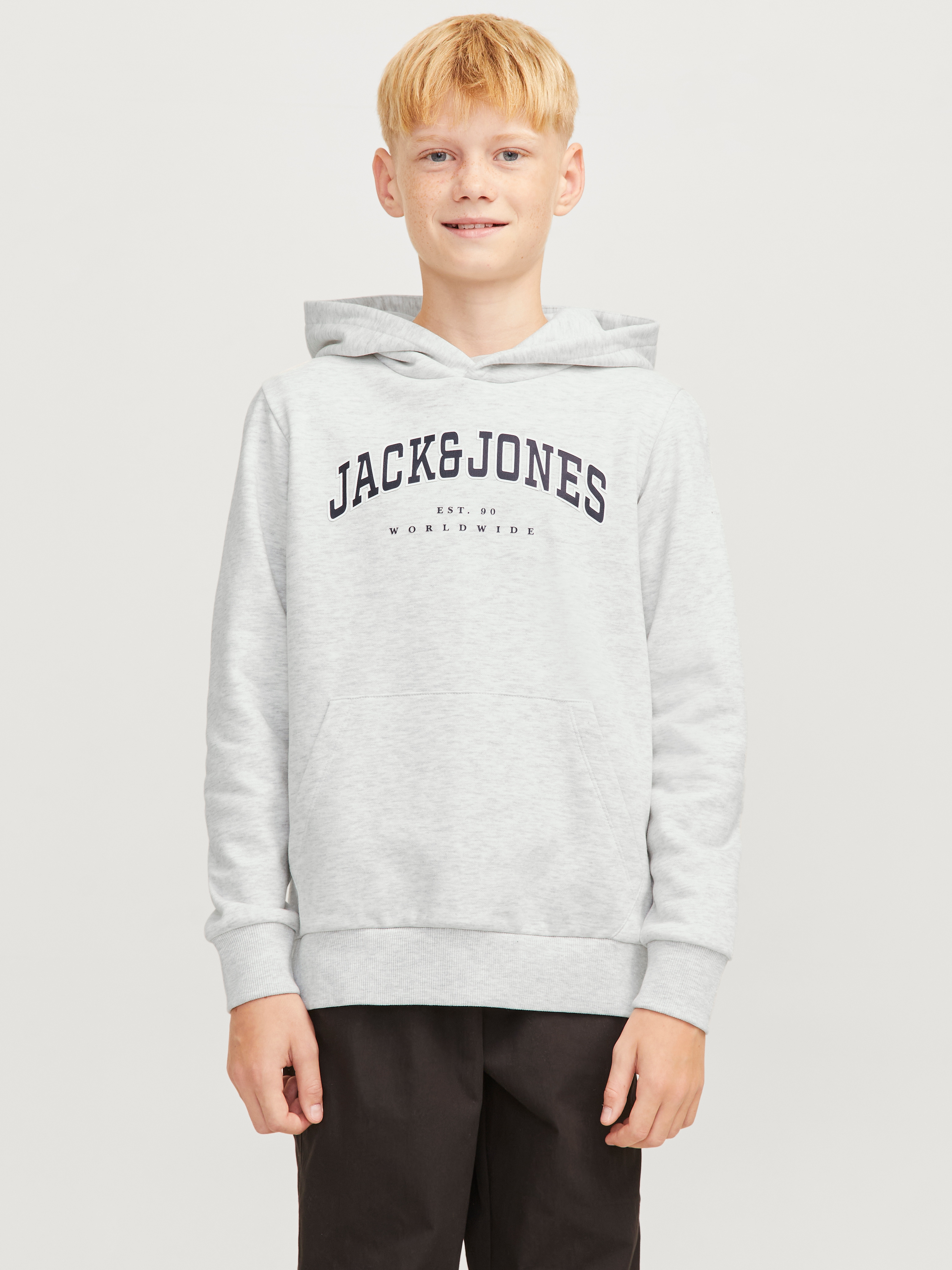 Kapuzensweatshirt JACK & JONES JUNIOR "JJECALEB VARSITY SWEAT HOOD NOOS JNR", Jungen, Gr. 128, weiß (weiß melange fit:loose), angeraute Sweatware, Obermaterial: 70% Baumwolle, 30% Polyester, bedruckt, relaxed fit, Rippbündchen, Sweatshirts