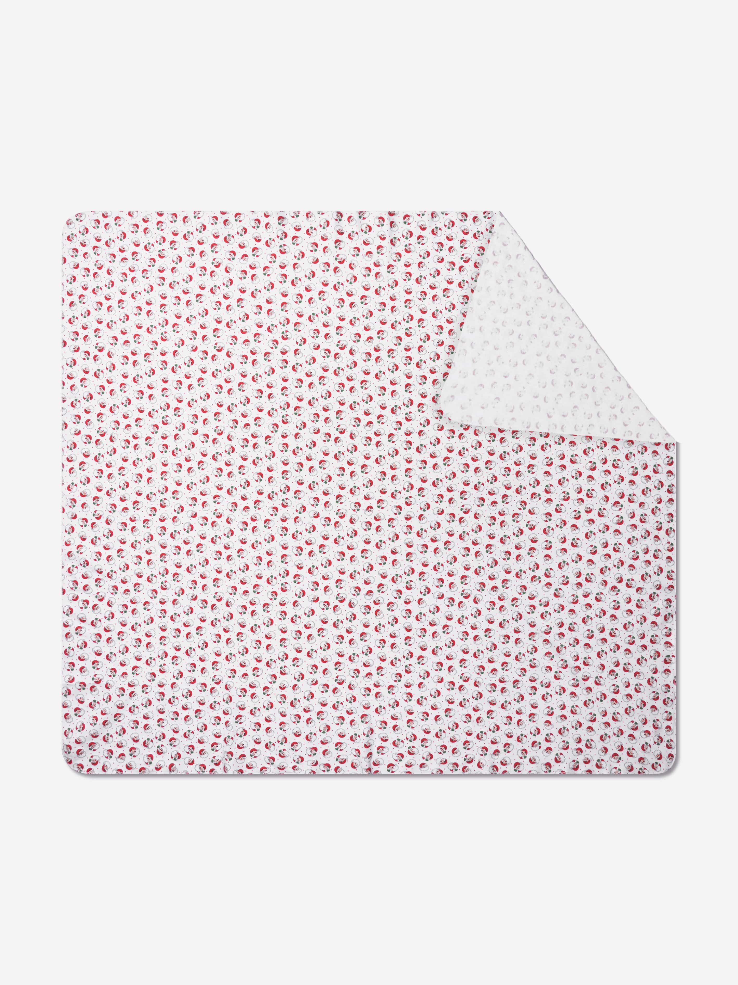 Magnolia Baby Winking Santa Printed Swaddle Blanket in Red - One Size | Magnolia Sale | Discount Designer Brands