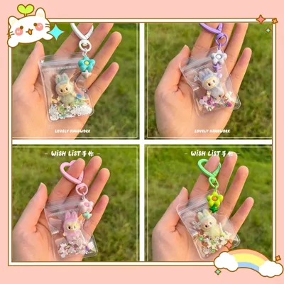 New Erchuang Plush Mini Labubu Rubble Vinyl Cute Grain Baby Walk Bag Mobile Pendant Cute Keychain