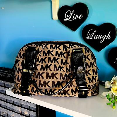 Michael Kors Bags | This Is Michael Kors Handbag That Is Tope And Black With Gold Accents. | Color: Tan | Size: Os