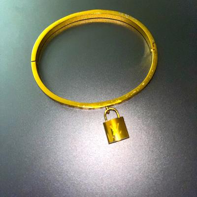 Louis Vuitton Jewelry | Gold Louis Vuitton Lock Dangle Bracelet With Original Box Never Worn | Color: Gold | Size: Os