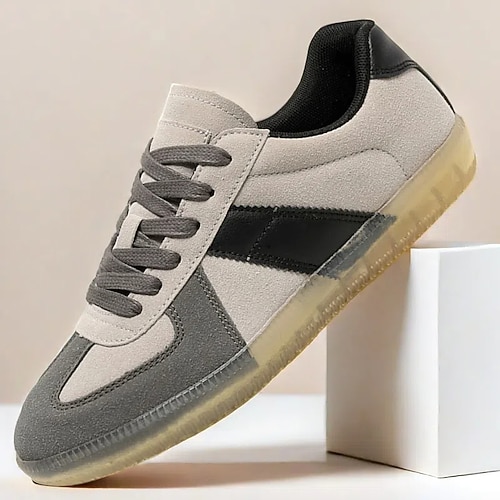 Lässige Wildleder-Sneaker für Herren mit grauen und schwarzen Streifen, bequemes Schnürdesign für den Alltag und sportliche Aktivitäten Image