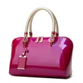 Borsa Boston in pelle lucida di design di lusso 2024 Fashion New Blue Red Black Beige Pink Borse da donna