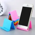 Staffa pigra Supporto per telefono cellulare Supporto da tavolo Supporto da scrivania in plastica Colore caramella Mini staffa di supporto portatile per telefono