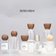 Bottiglia di profumo vuota in vetro trasparente/smerigliato di alta qualità 30/50/100ml Bottiglia di profumo con coperchio in legno Bottiglia spray Toner Atomizzatore Bottiglie cosmetiche