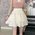 Gonna a pieghe a trapezio bianca da donna con volant dolce hottie stile preppy elastico in vita sottile sottile semplice casual estate all'ingrosso