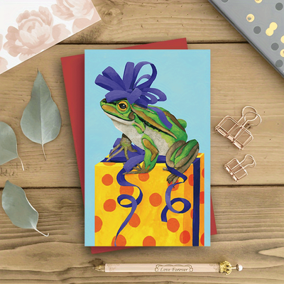 TEMU Festive Frog Birthday Card: A Whimsical Green Frog In A Purple Ribbon Hat Sits On An Box With Blue Polka Dots And Ribbons - Perfect For Gifting To Family And Image