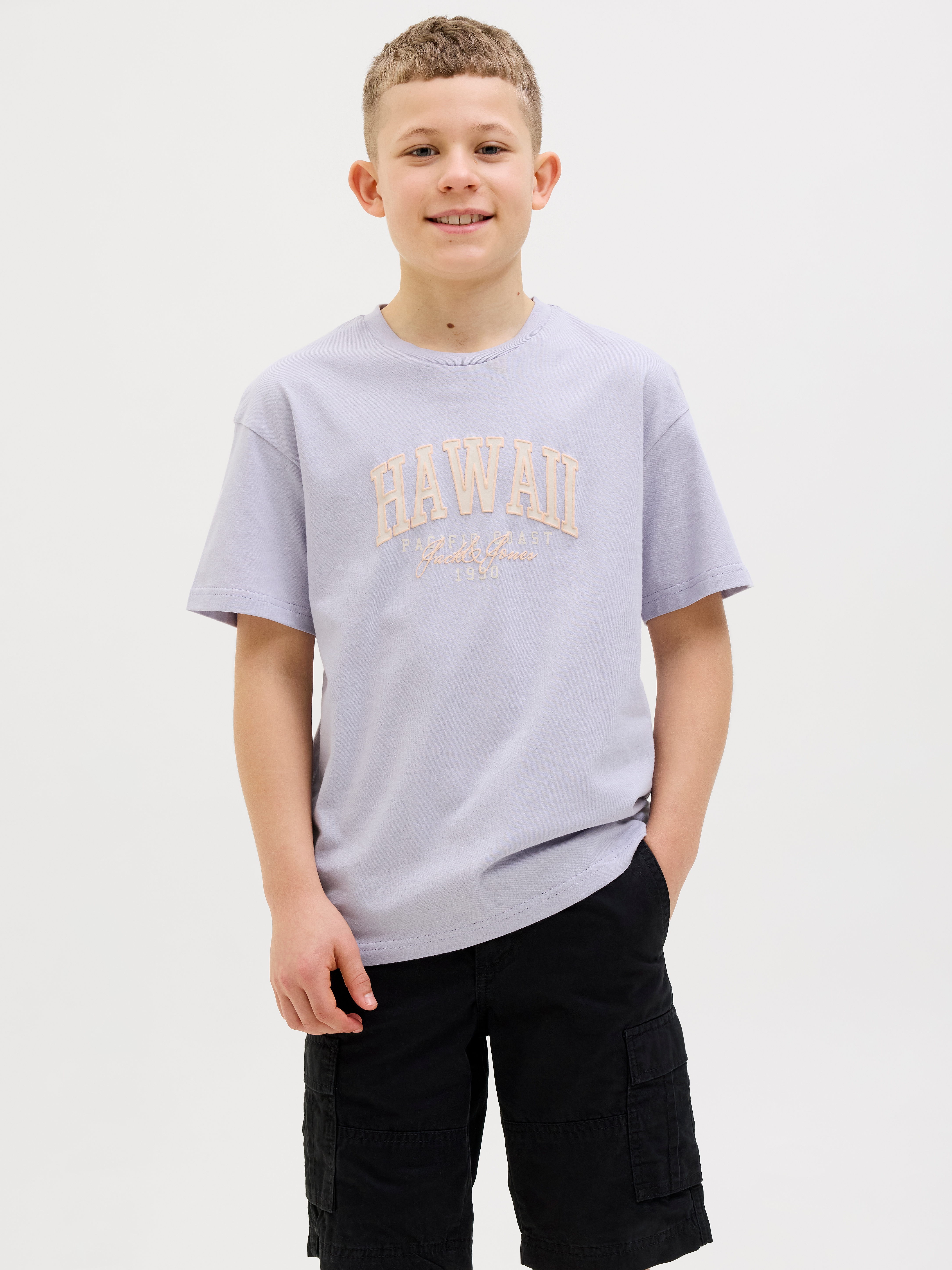 T-Shirt JACK & JONES JUNIOR "JJDETROIT TEE SS CREW NECK JNR", Jungen, Gr. 128, lila (languid lavender), Single Jersey, Obermaterial: 100% Baumwolle, bedruckt, relaxed fit, Rundhals, Shirts T-Shirt