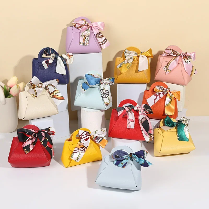 40 Stück Leder-Süßigkeitstüten für Hochzeit, Babyparty, neue rosa blaue Gäste-Geschenkverpackungsbeutel mit Band, Verteilerungen, Party-Geschenkbox Image