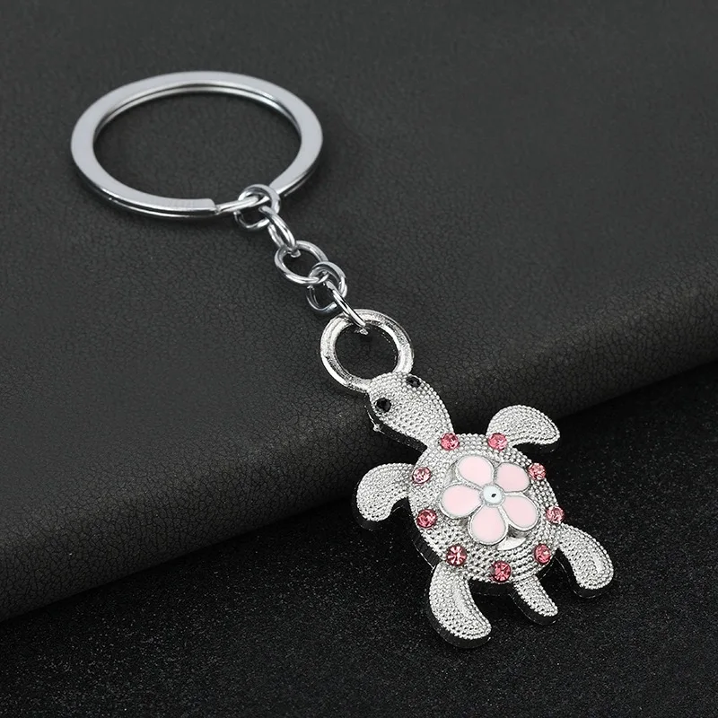 Noter Neuer Luxus-Schildkröten-Schlüsselanhänger, 4-Farben-Auto-Tasche, Dekoration, Strand, Surfen, Schmuck, Metallhalter, hängender Schlüsselanhänger, Rucksack-Schmuck Image