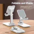 Supporto per telefono cellulare supporto da tavolo supporto per telefono pieghevole girevole supporto per Ipad supporto di sollevamento portatile in metallo in lega