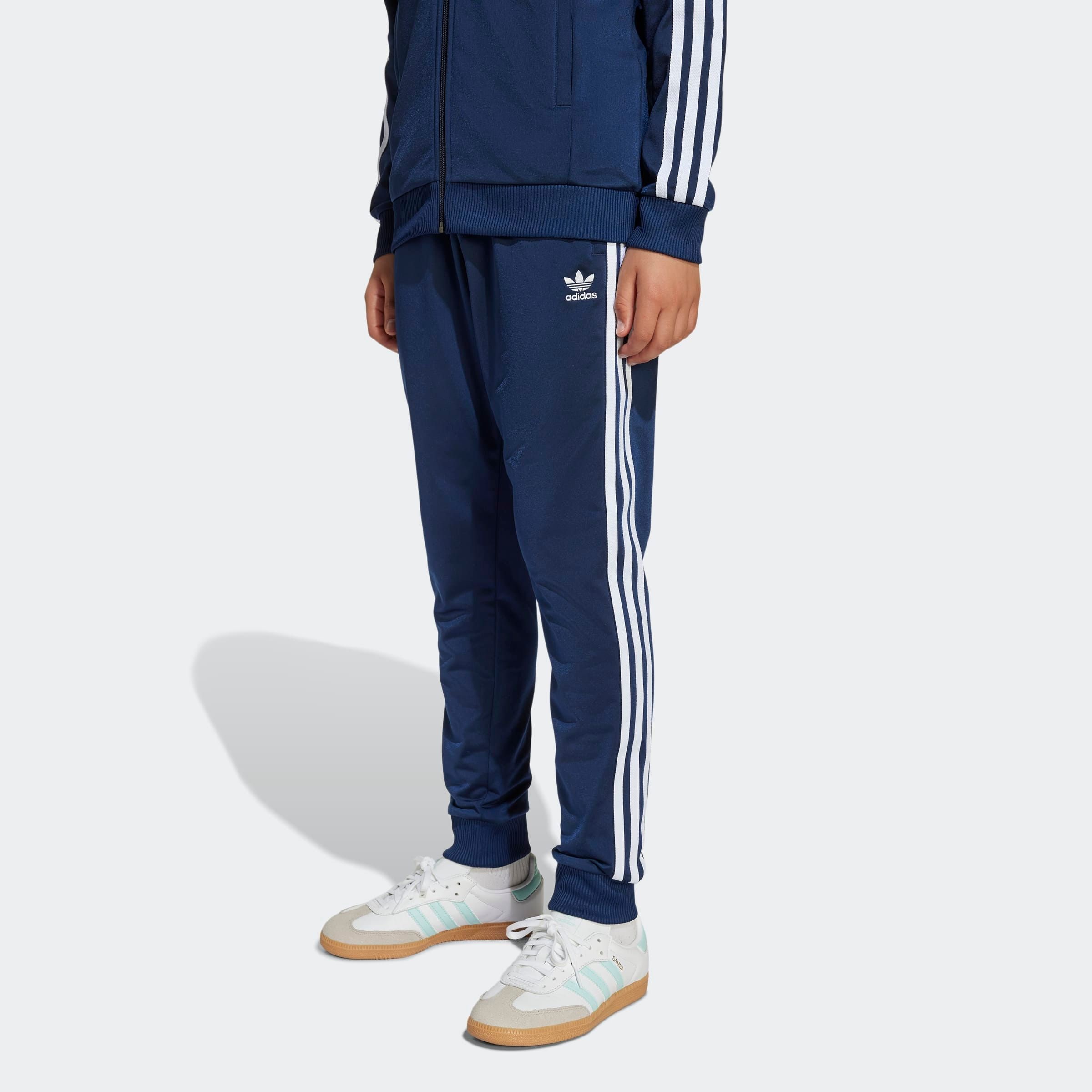 Sporthose ADIDAS ORIGINALS "SST TRACK PANTS", Kinder, Gr. 164, N-Gr, blau (night indigo, weiß), Trikot, Obermaterial: 100% Polyester, Sportlich, Hosen, Superstar Kinder Trainingshose Image