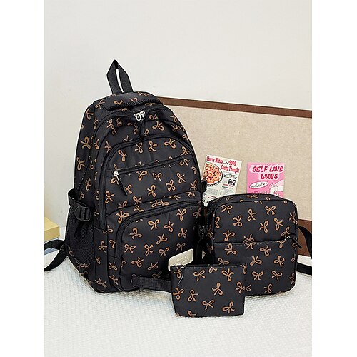 Set di 3 zaini scolastici per ragazze adolescenti: zaino in tela leggero con stampa di un grazioso fiocco rosa, borsa a tracolla di grande capacità e astuccio per matite, perfetto per la scuola, i viaggi e l'uso quotidiano.