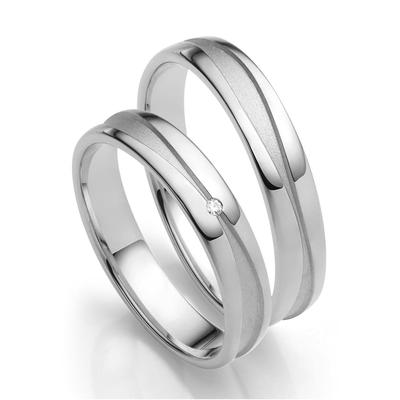 Trauring FIRETTI "Schmuck Geschenk Gold 750 Hochzeit Ehering "LIEBE" Gr. 50, weiß (weißgoldfarben), Fingerringe, 50, 0,01 ct SI = kleine Einschlüsse mit Brillant, Weißgold 375, 4mm, Made in Germany, wahlweise mit oder ohne Brillant Image