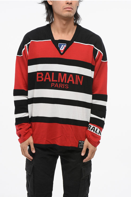 Pullover aus Schurwolle mit V-Ausschnitt in Rosso, Bianco und Nero Image