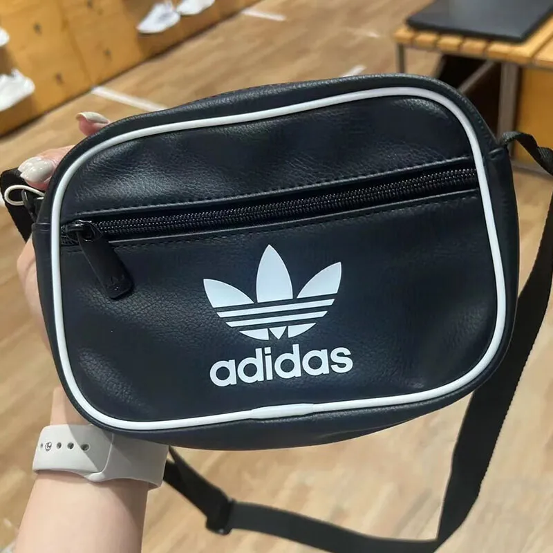 Borsa a tracolla in pelle nera serie Adidas Originals Tasche compatte ed eleganti con cerniera per l'uso quotidiano Moda di strada e viaggi