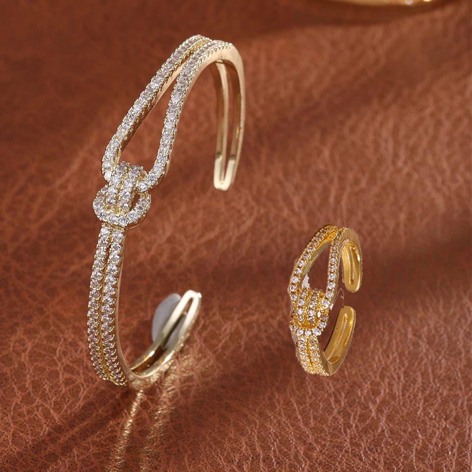 ZAKOL Klassischer geknoteter Nischendesign-Mikro-Intarsien-Zirkon-offener Armbandring für Frauen, exquisiter Hochzeitsschmuck Image