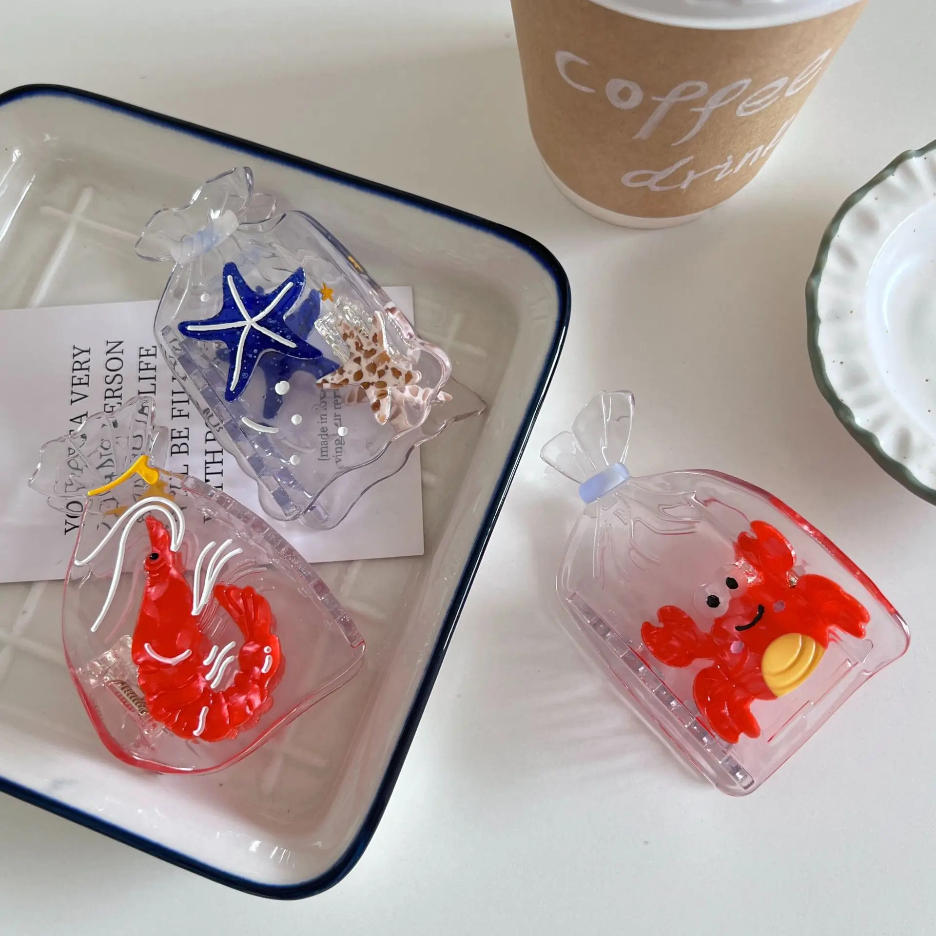 1 Stück kreatives Design transparente Essigsäure-Greifklammer, Marine Life Series Haargreifer Driftenflasche Seestern Haarnadel Haaraccesso Image