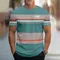 Abbigliamento a maniche corte stampato a righe di moda 2025 Abbigliamento casual da uomo T-shirt da uomo allentata semplice Top Abbigliamento da uomo morbido e traspirante