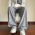 Pantaloni casual estivi da uomo pantaloni larghi oversize da uomo streetwear giapponese pantaloni larghi in seta di ghiaccio pantaloni a pieghe da uomo M-3XL