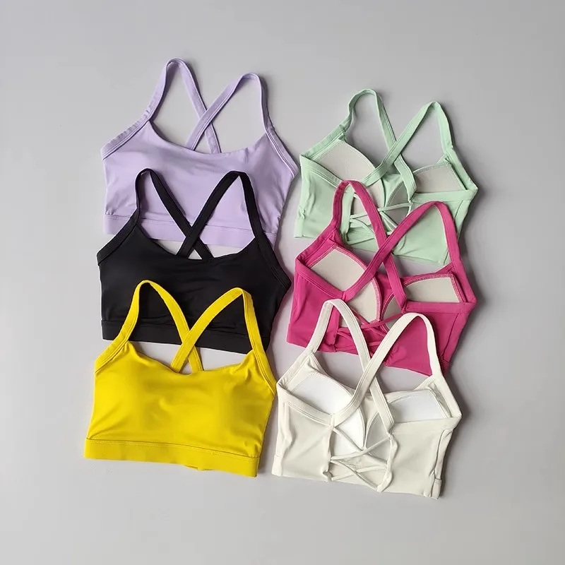 Sous-vêtements de Yoga de couleur unie pour femmes, soutien-gorge de Fitness, dos croisé doux, Push-Up, haut de Sport avec coussinet de poitrine, gilet de Yoga, haut court de Sport
