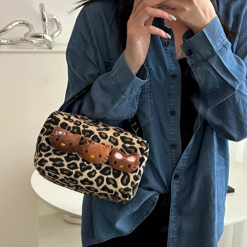 Sanrio Hello Kitty Black Skin Leopardenmuster Mädchen Kosmetiktasche Hohe Kapazität Tragbare Reisehandtasche Outdoor Kulturbeutel mit Reißverschluss