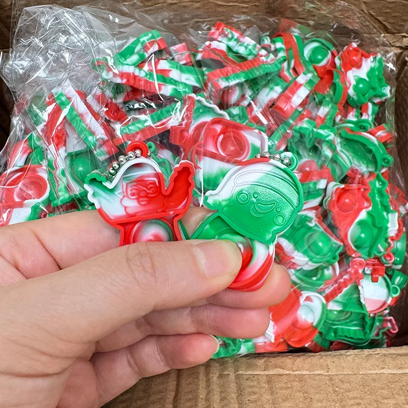 10-30Pcs Weihnachten Mini Pop Schlüsselanhänger Weihnachten Baum Hängende Ornamente Weihnachten Home Dekoration Neue Jahr Party Kinder Geschenk zappeln Spielzeug Image