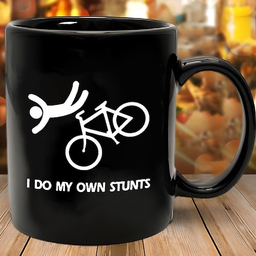 lustige Geschenktasse, 325 ml, schwarze Keramik, „I do my own stunts", Kaffeetasse mit Fahrradunfall-Grafik, humorvolles Scherzgeschenk für Männer, Frauen, Freunde, Radfahrer, Büro, Zuhause Image