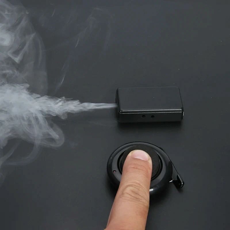 Remote Control Mini Smoke Device For Magicians Wearable Arm Controlled Magic Prop With Large Smoke Volume And USB Char Remote Control Mini Smoke Device For Magicians Wearable Arm Controlled Magic Prop With Large Smoke Volume And USB Char
